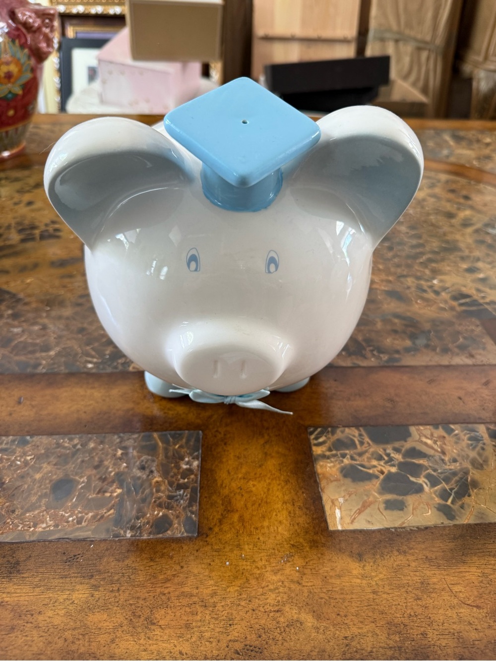 White Ceramic Piggy Bank with Light Blue Graduation Cap